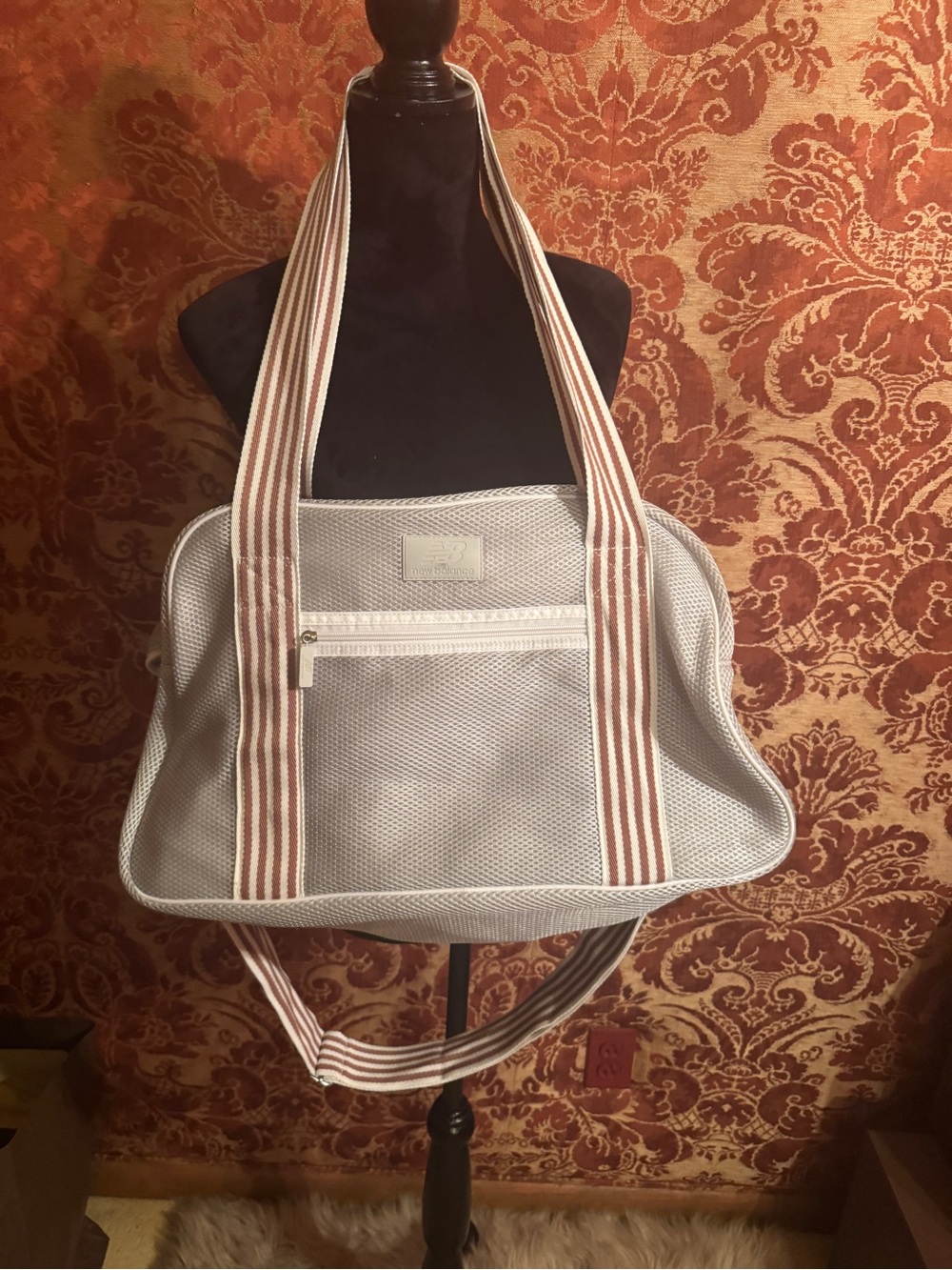 New Balance light gray mesh tote with red striped straps